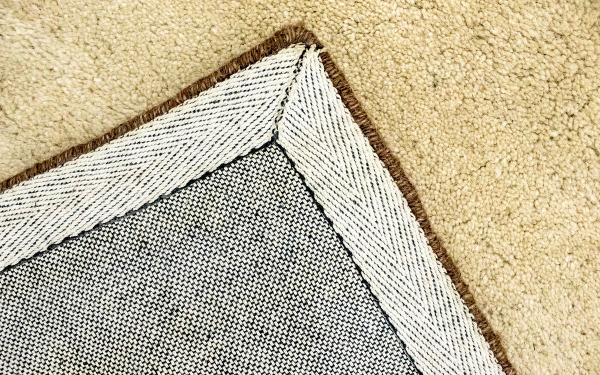 Dywan wełniany - 196 x 139 cm - beżowy