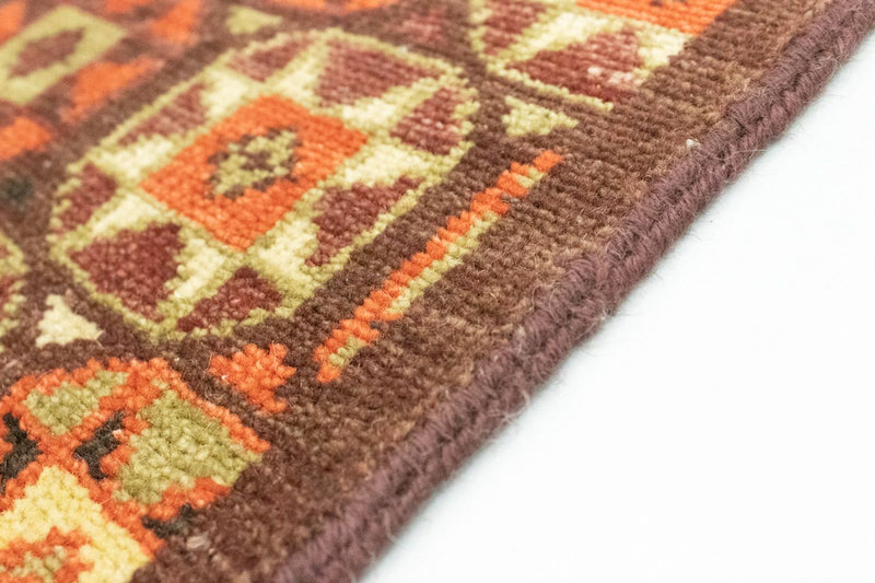 Designerski dywan - 97 x 60 cm - brązowy