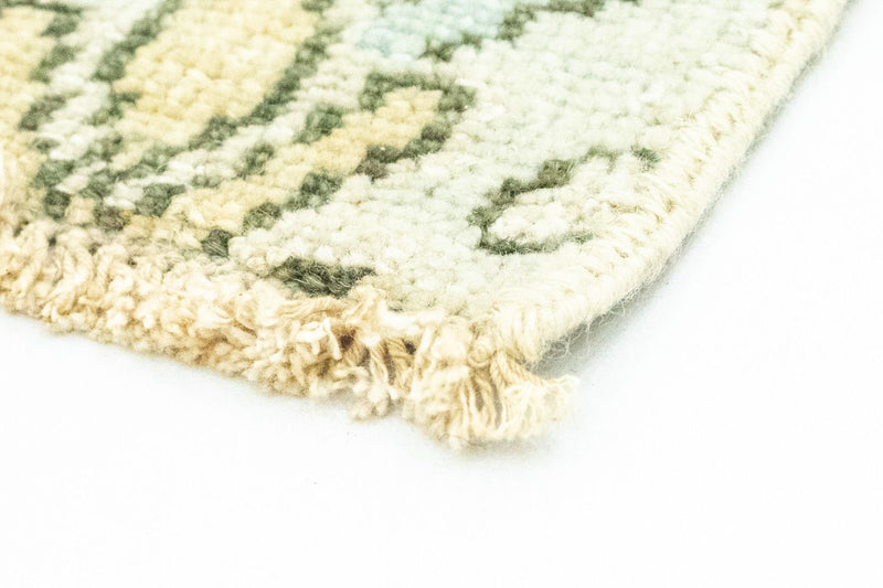 Designerski dywan - 93 x 58 cm - beżowy