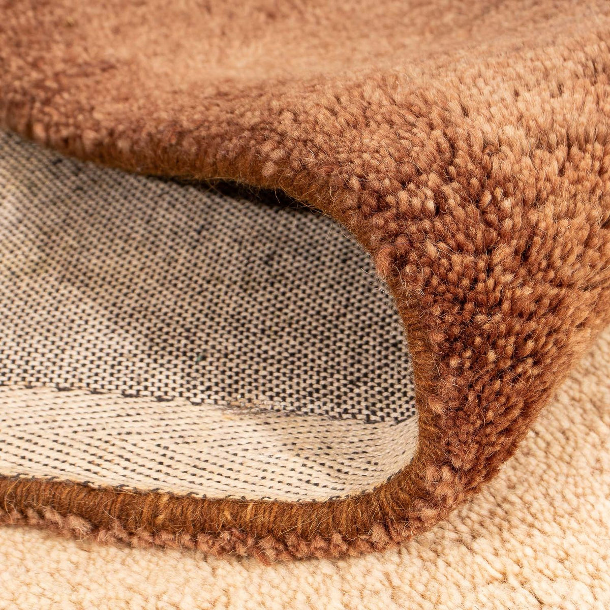 Dywan wełniany - 196 x 139 cm - brązowy