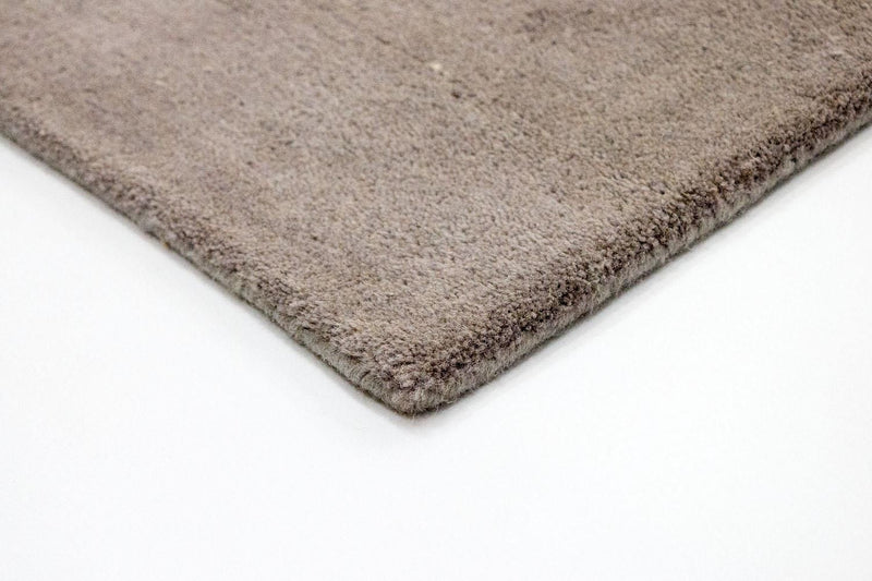 Designerski dywan - 242 x 153 cm - brązowy