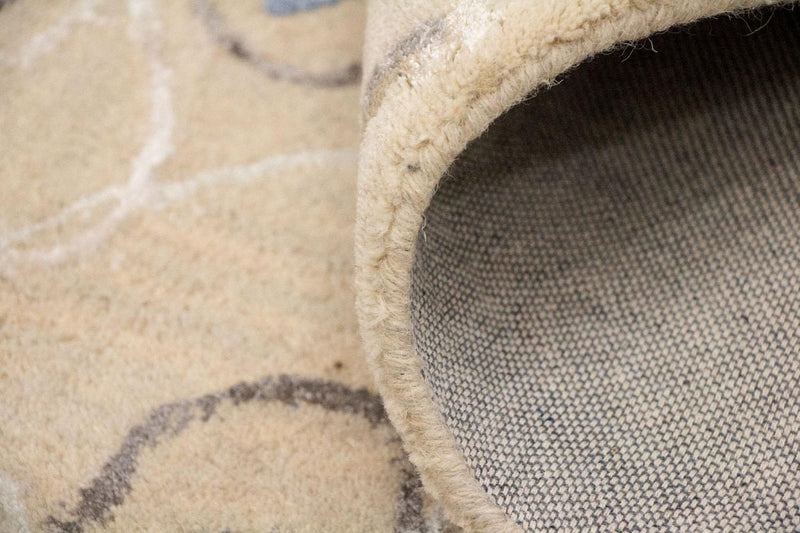 Designerski dywan - 242 x 152 cm - beżowy