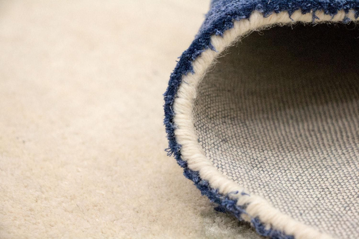 Designerski dywan - 240 x 152 cm - beżowy