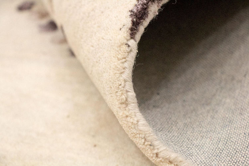 Designerski dywan - 243 x 153 cm - beżowy