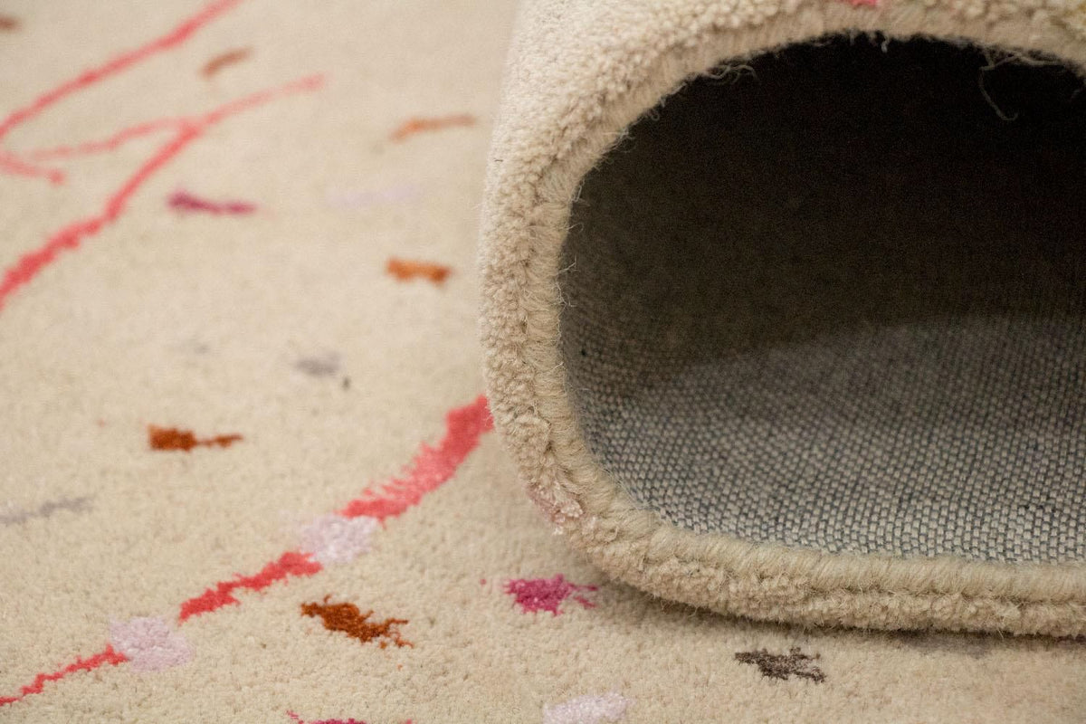 Designerski dywan - 244 x 155 cm - beżowy