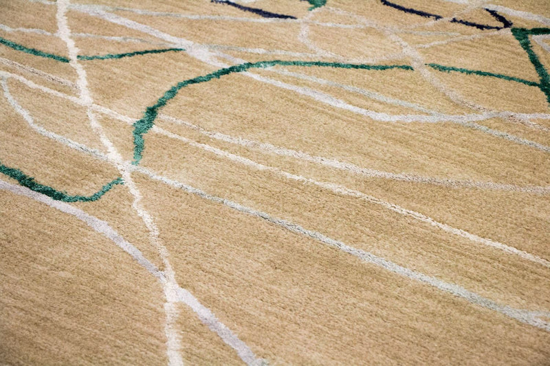 Designerski dywan - 242 x 153 cm - beżowy