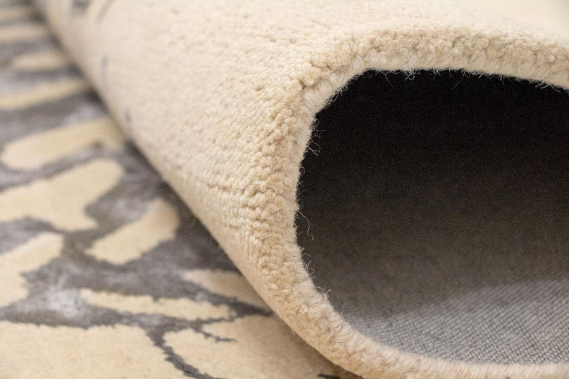 Designerski dywan - 240 x 153 cm - beżowy