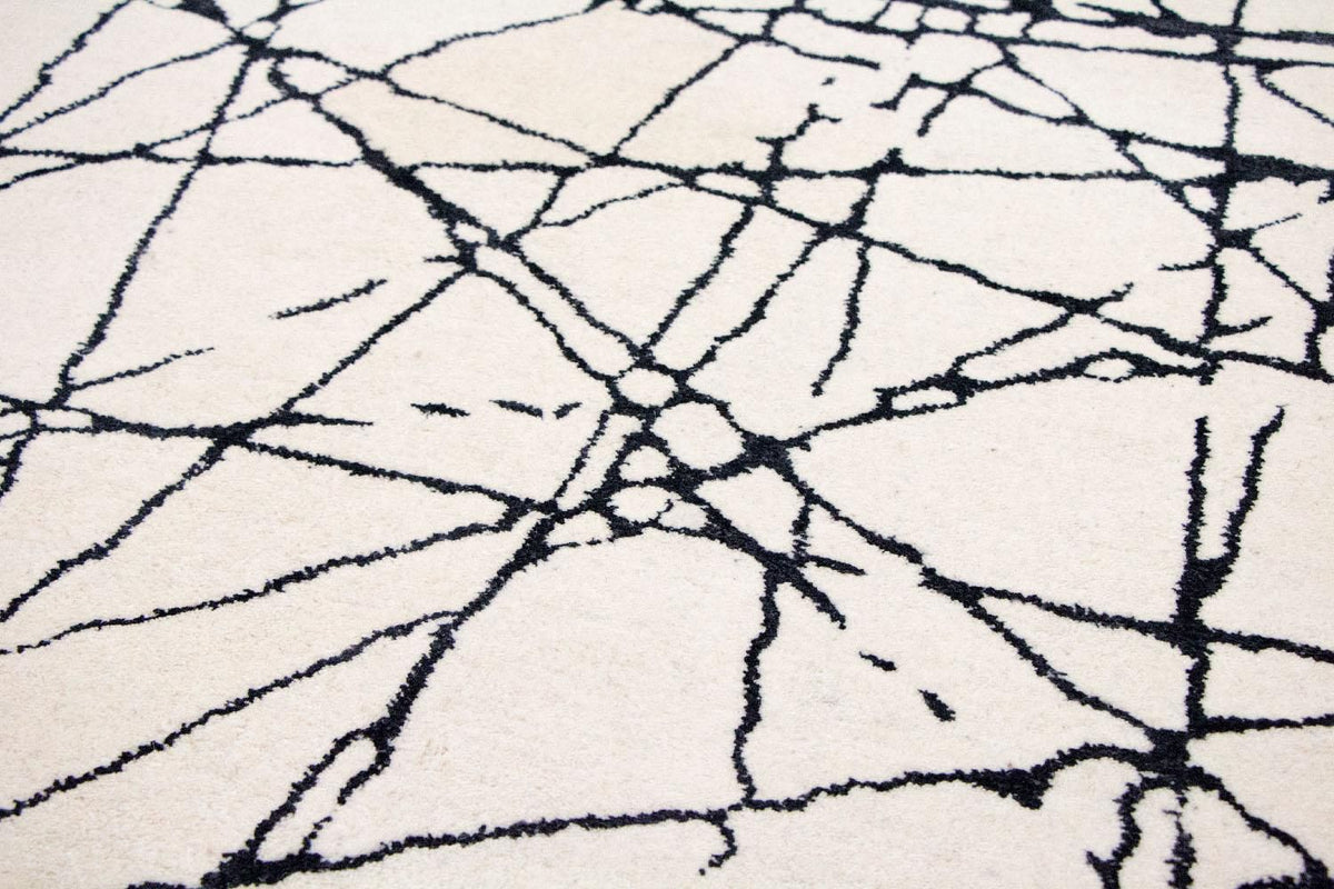 Designerski dywan - 181 x 121 cm - beżowy