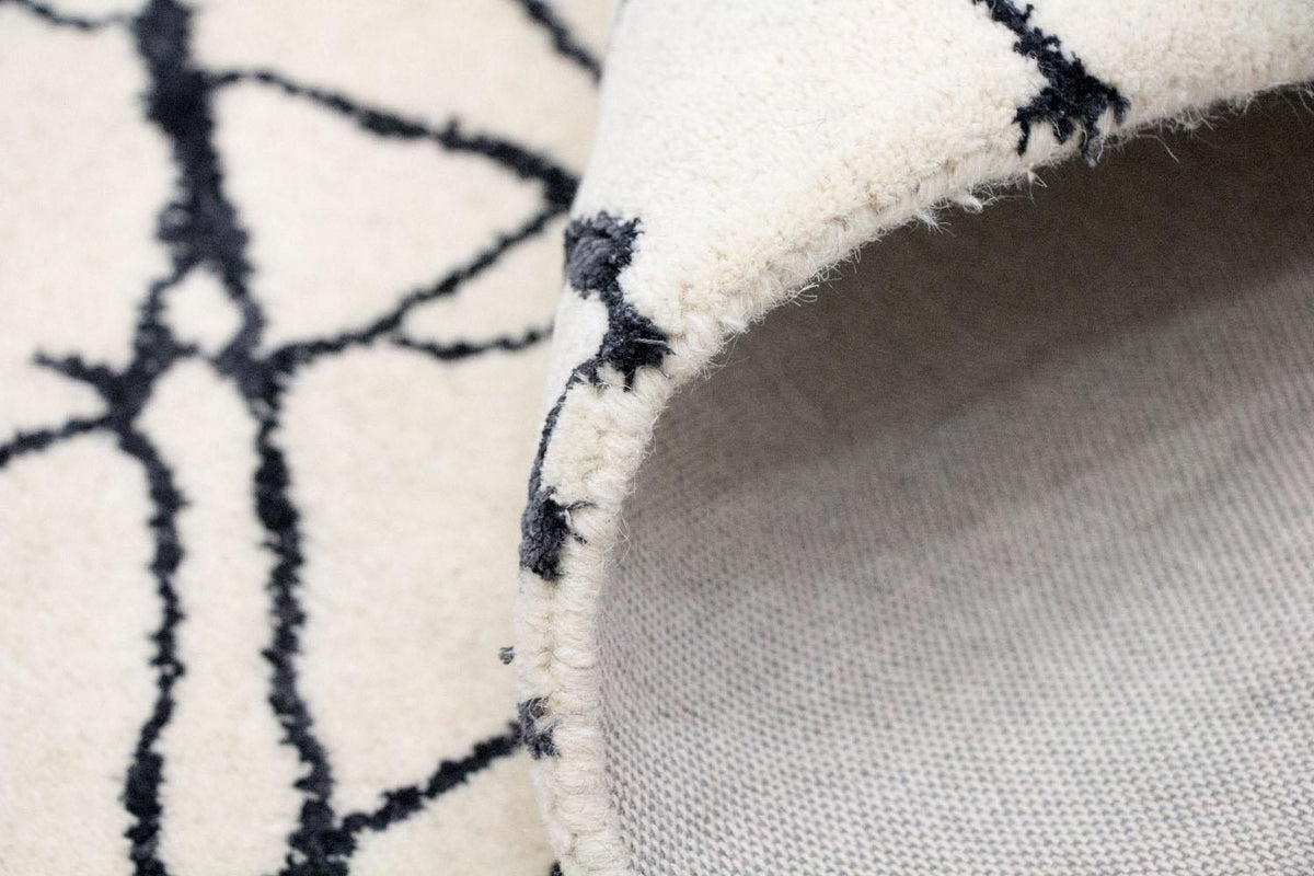 Designerski dywan - 181 x 121 cm - beżowy