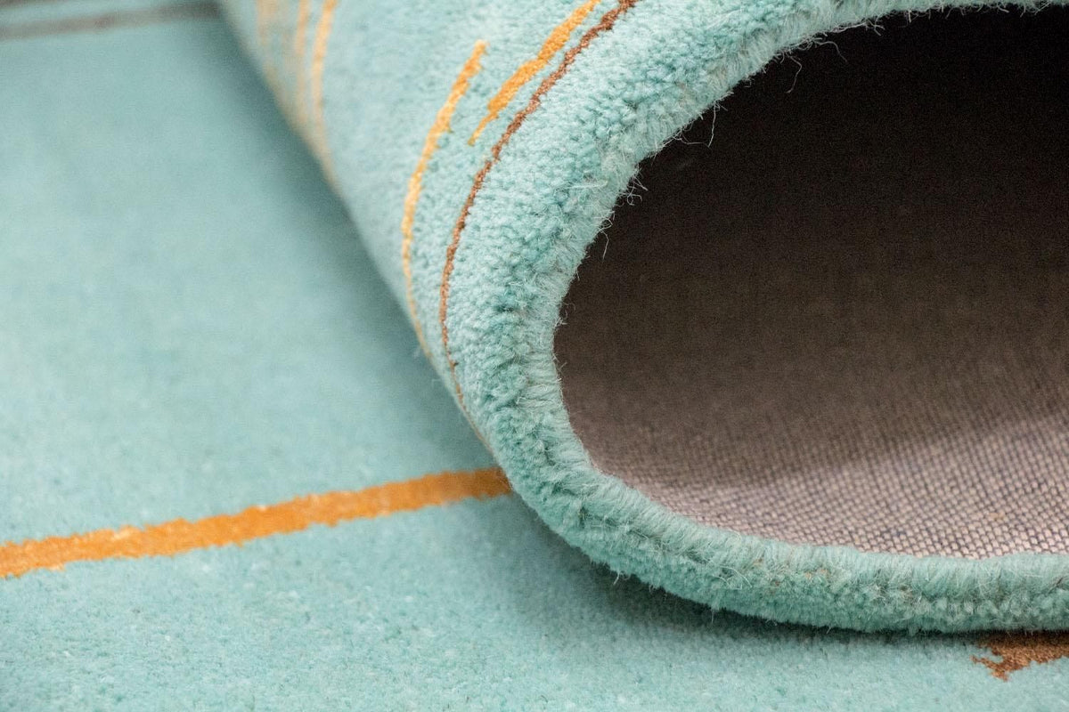 Designerski dywan - 244 x 154 cm - turkusowy