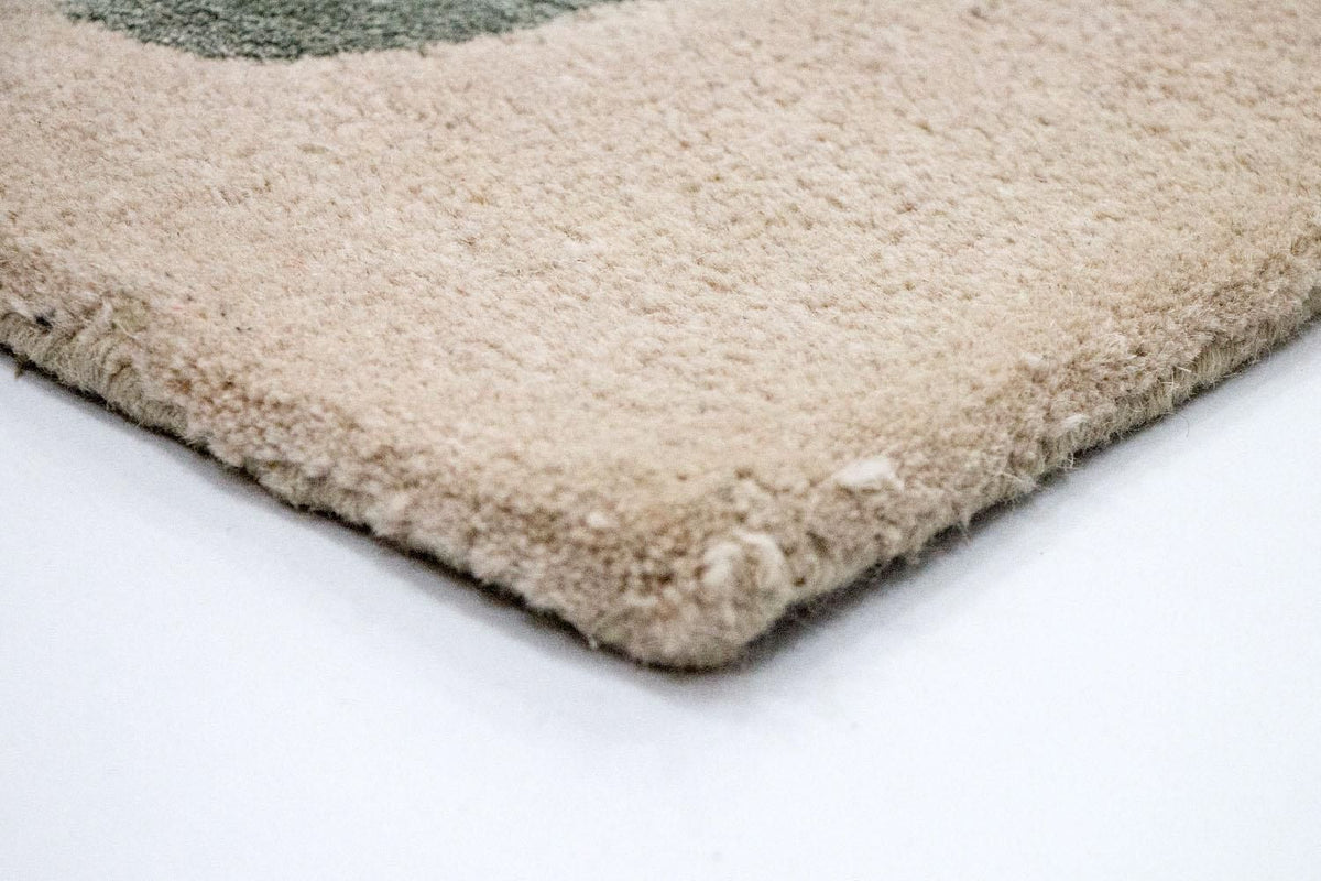 Designerski dywan - 179 x 121 cm - beżowy