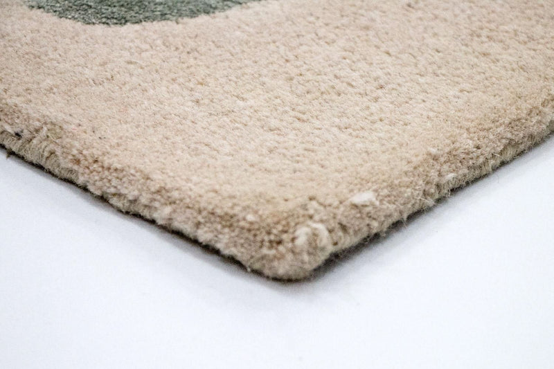 Designerski dywan - 179 x 121 cm - beżowy