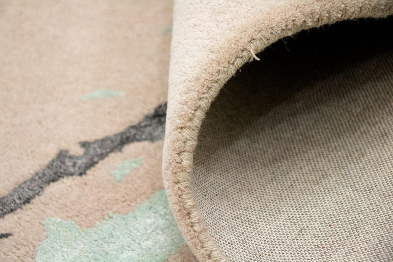 Designerski dywan - 179 x 121 cm - beżowy