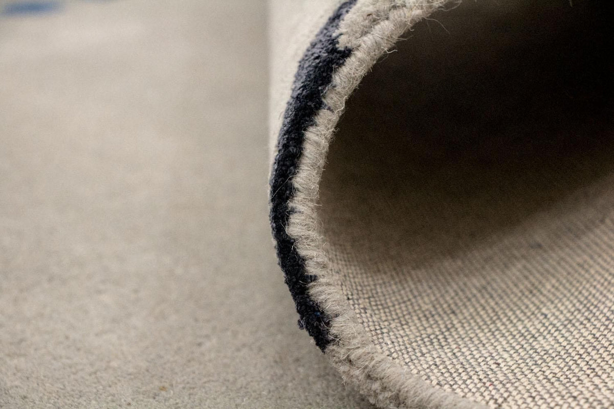 Designerski dywan - 242 x 155 cm - brązowy