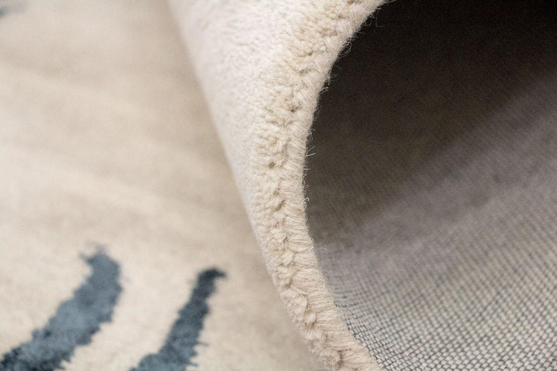 Designerski dywan - 242 x 153 cm - beżowy