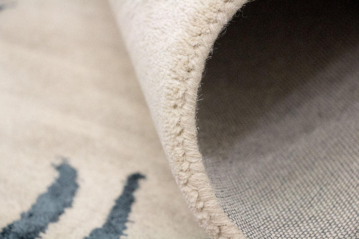 Designerski dywan - 242 x 153 cm - beżowy