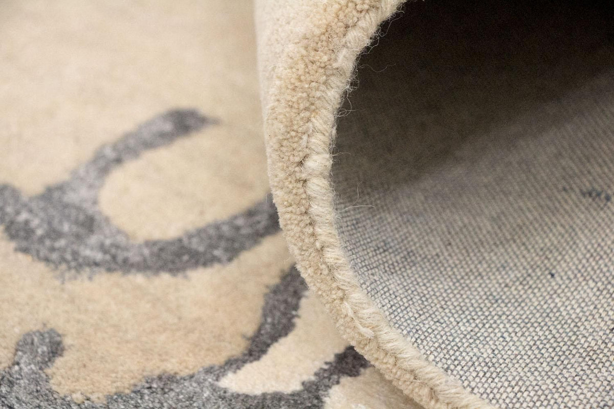 Designerski dywan - 241 x 154 cm - beżowy