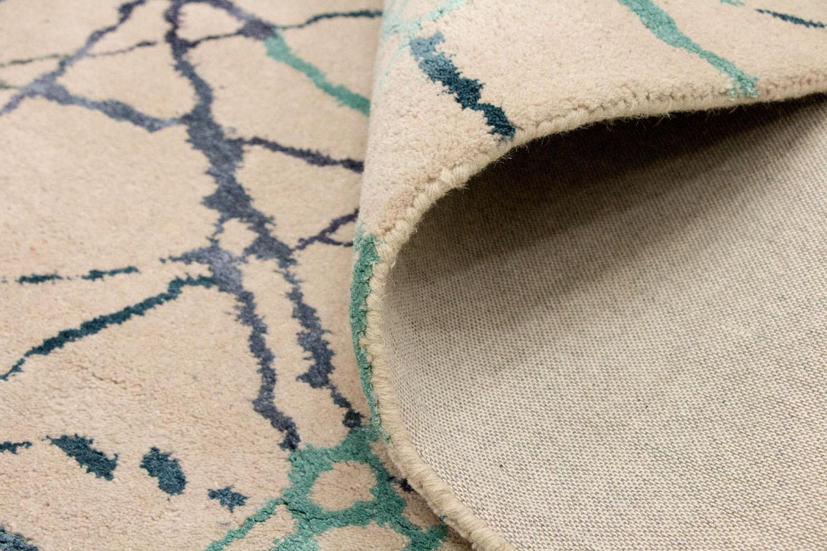 Designerski dywan - 197 x 136 cm - beżowy