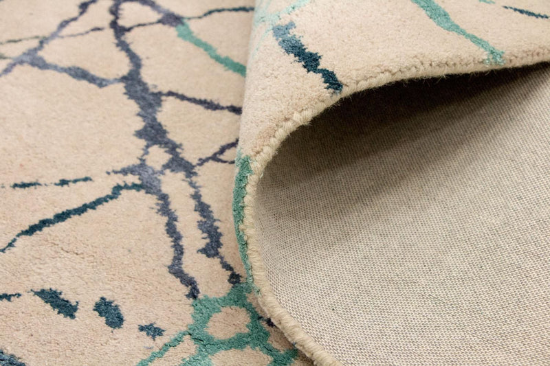 Designerski dywan - 197 x 136 cm - beżowy