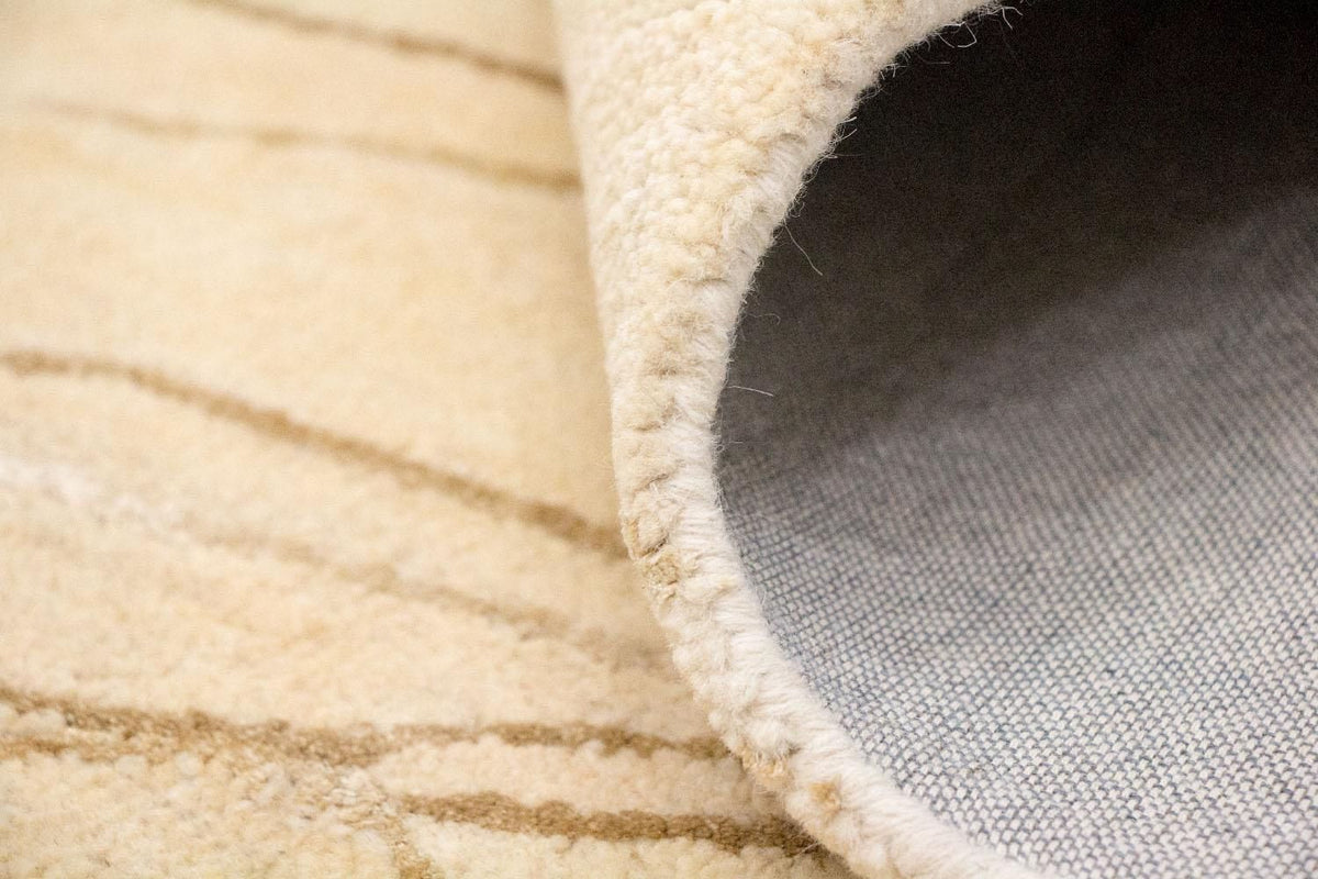 Designerski dywan - 240 x 153 cm - beżowy