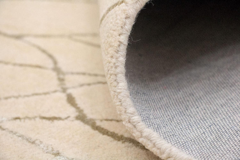 Designerski dywan - 239 x 152 cm - beżowy