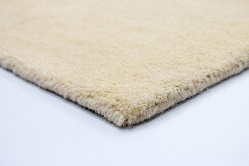 Designerski dywan - 239 x 152 cm - beżowy