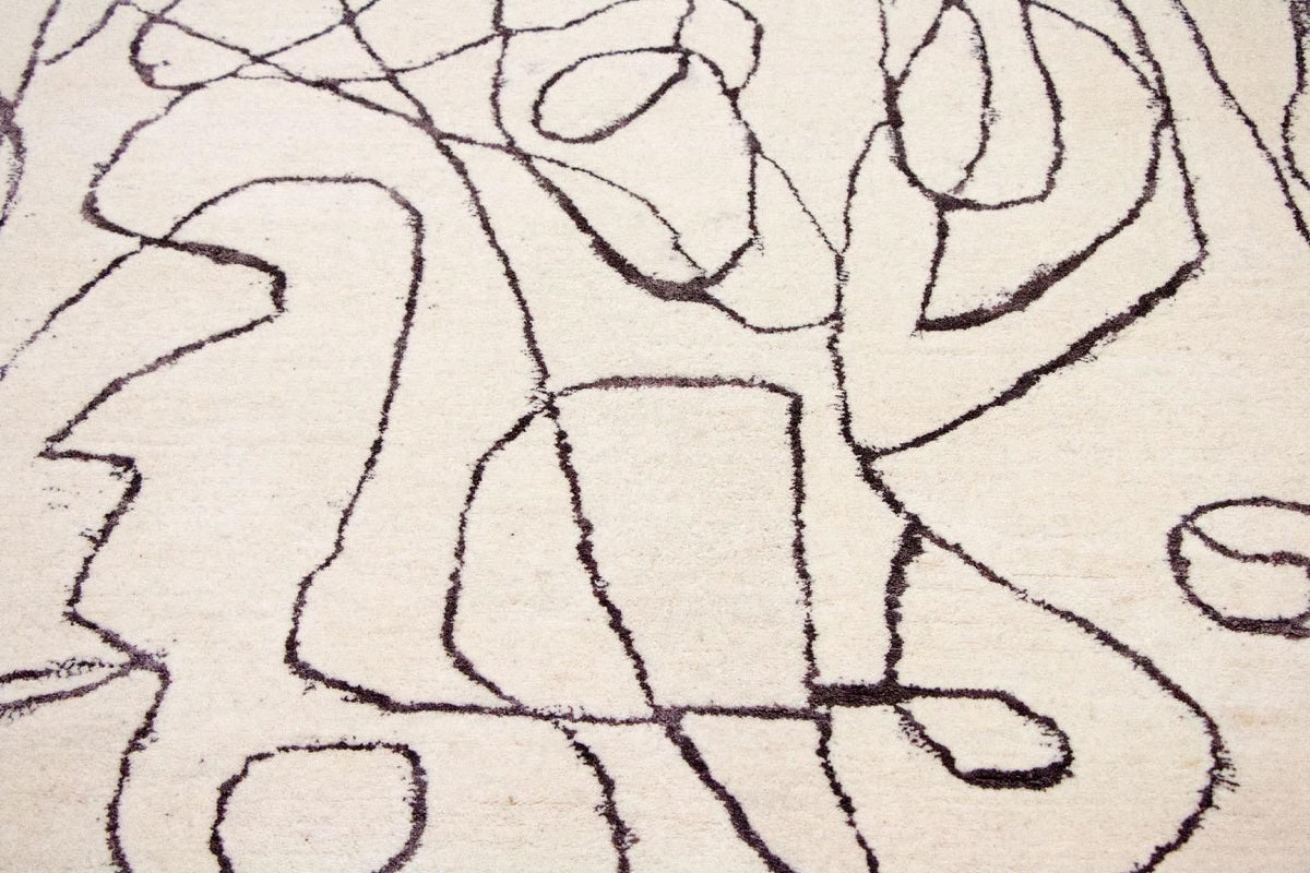 Designerski dywan - 243 x 153 cm - beżowy