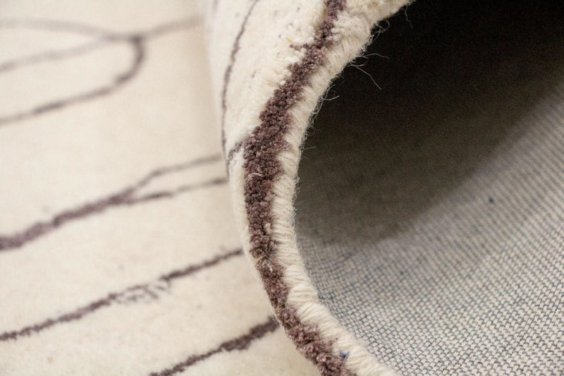 Designerski dywan - 243 x 153 cm - beżowy