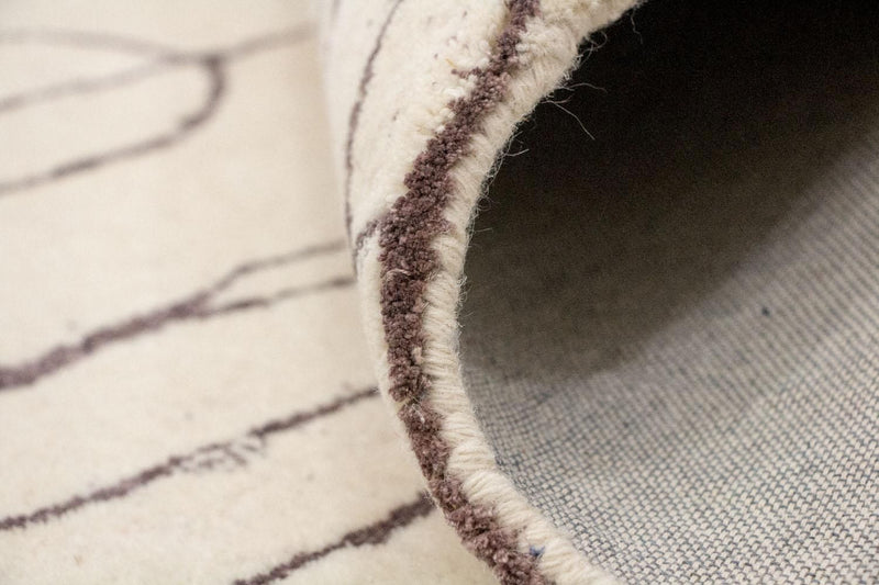 Designerski dywan - 243 x 153 cm - beżowy