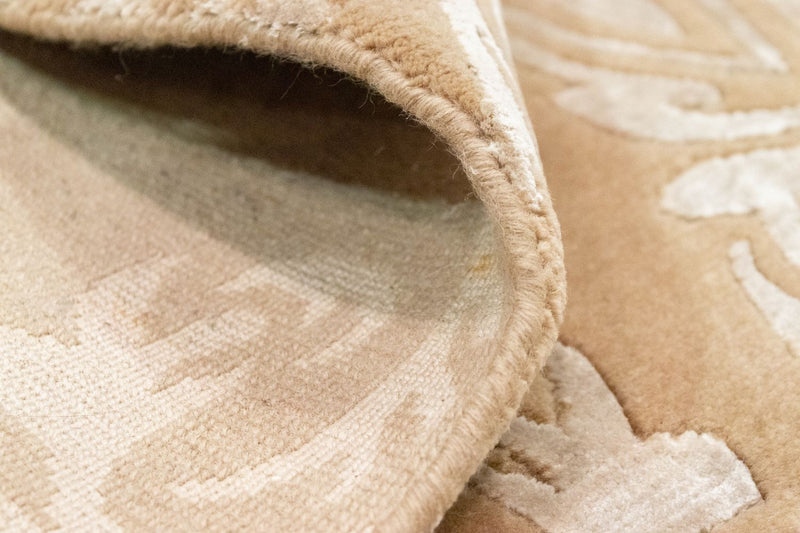 Designerski dywan - 182 x 127 cm - brązowy