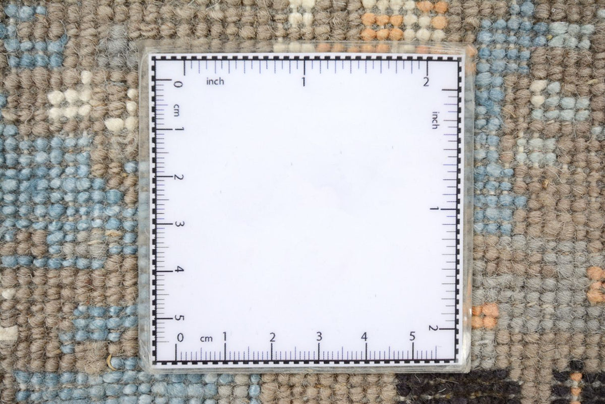 Designerski dywan okrągły  - 243 x 241 cm - wielokolorowy