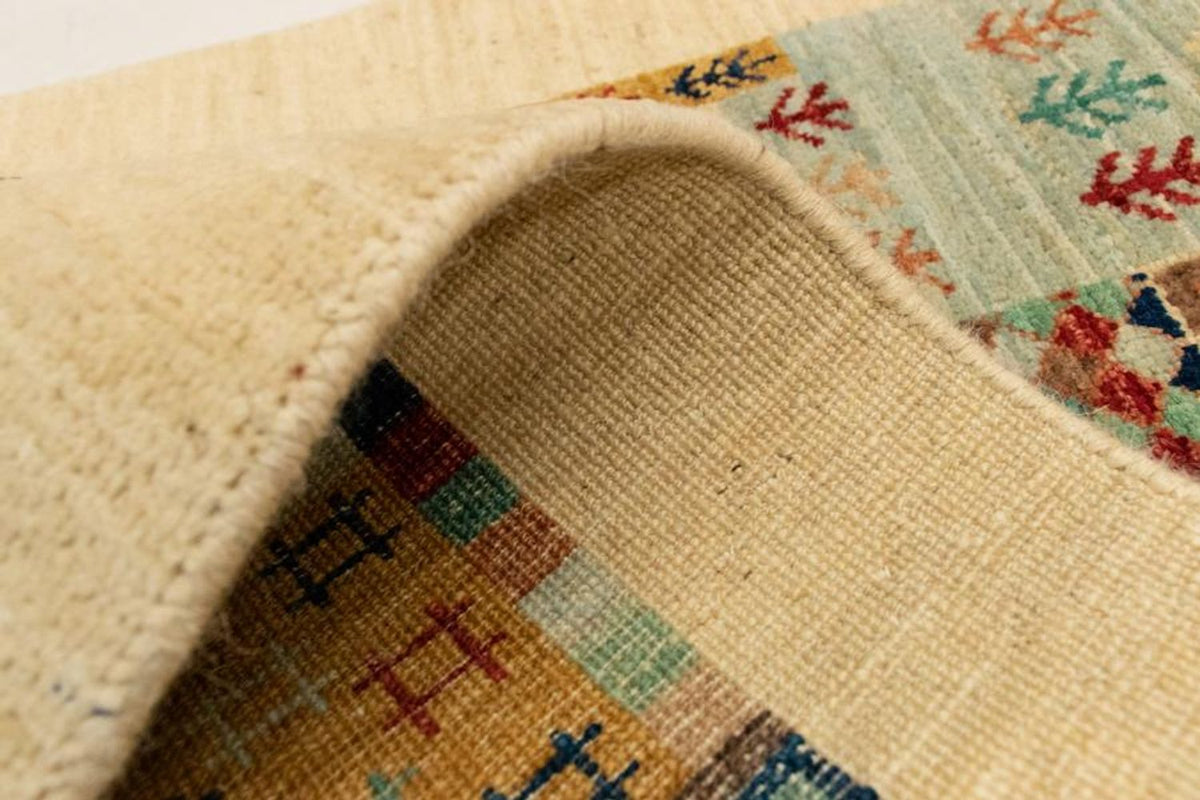 Designerski dywan - 137 x 69 cm - beżowy